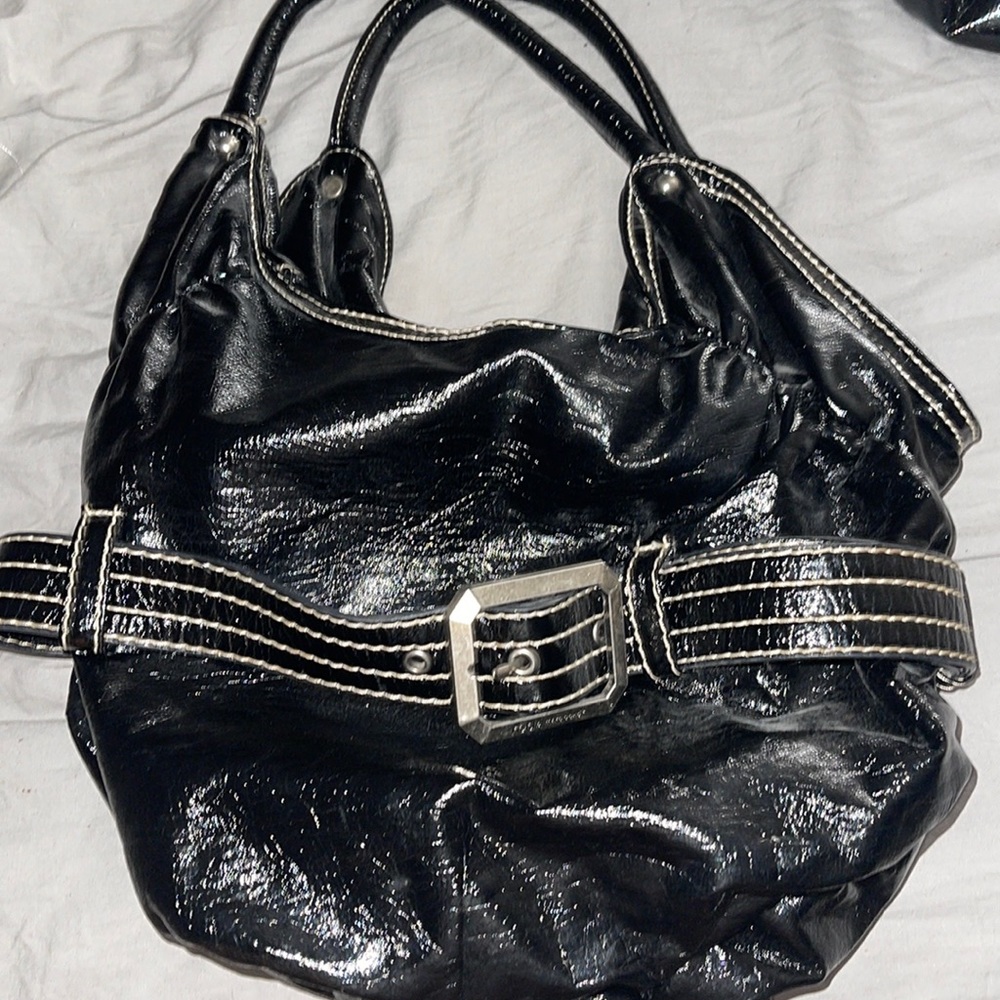 Red by Marc ecko black leather purse with belt nice never used red interior